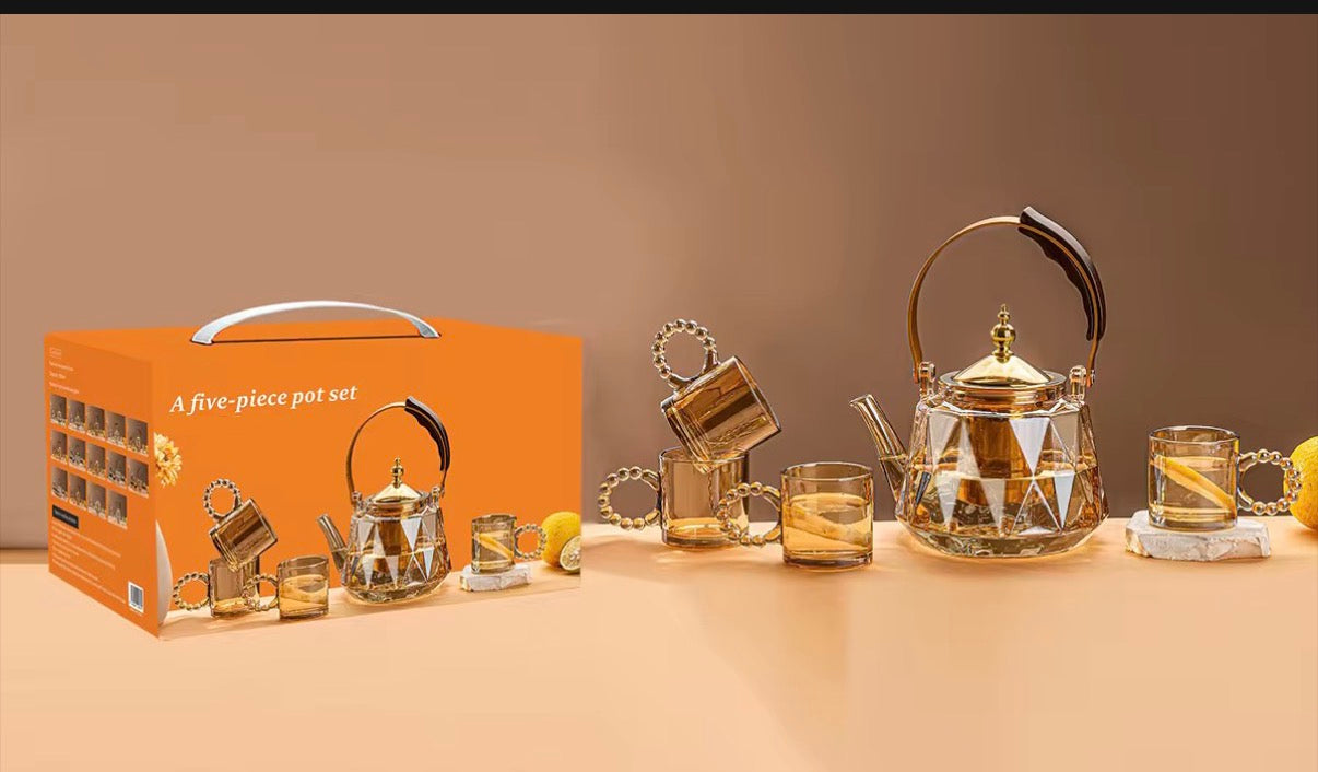 A Five Piece Glass Pot Set